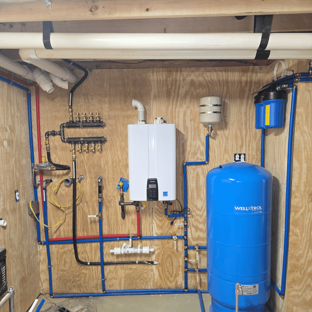 Water heater, pressure tank, and supply lines in a utility room