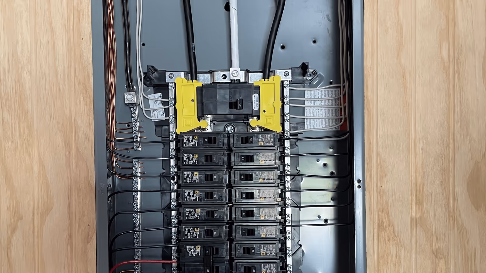 Breaker panel with a whole-home surge protector installed
